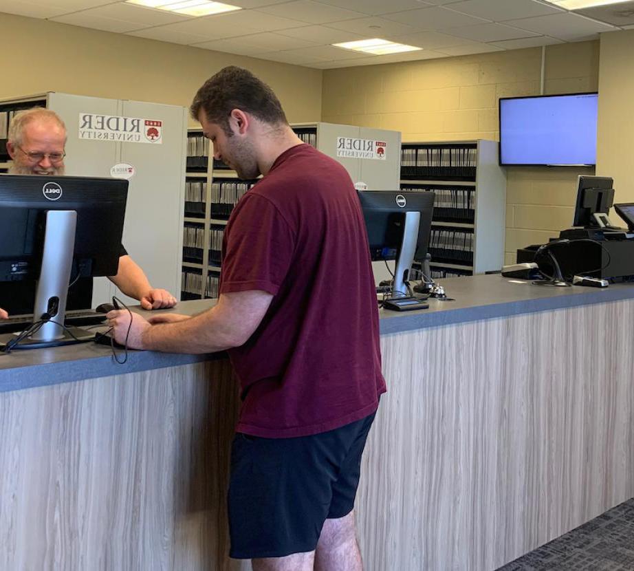 Rider student gets mail at Rider University mailroom